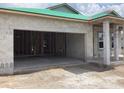 New construction home with concrete block walls and a garage showing the home being built at 5724 Haystack Drive, St Cloud, FL 34771