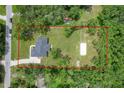 Aerial view of the property showing the home, large lot, and surrounding landscape at 5080 Maple Dr, Lakeland, FL 33810
