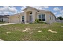 Attractive one-story house featuring a manicured front lawn and inviting entrance at 3629 Welsh Way, Lakeland, FL 33813