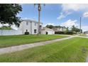 Two-story house with a lush green lawn at 1491 Nappa Dr, Port Orange, FL 32128