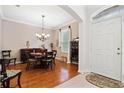 Formal dining room with hardwood floors and a chandelier at 210 Brookgreen Way, Deland, FL 32724