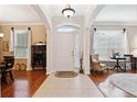 Bright and airy foyer with hardwood floors and high ceilings at 210 Brookgreen Way, Deland, FL 32724