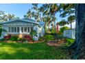 Inviting patio with seating area, perfect for outdoor relaxation at 111 Fleming Ave, Port Orange, FL 32127