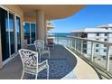 Relax on this balcony with beautiful ocean views and comfortable seating area at 3703 S Atlantic Ave # 501, Daytona Beach Shores, FL 32118