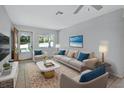 Bright living room featuring neutral tones, plush seating, and stylish decor at 532 W Wisconsin Ave, Deland, FL 32720