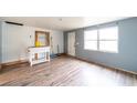 Living room with wood flooring and gray walls at 126 Kensington Ave, Deland, FL 32724