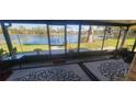 Enjoy lake views from this screened porch at 507 Dade Ct, Deltona, FL 32725