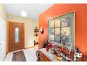 Inviting entryway with wood door and decorative accents at 2573 Delaware Rd, Deltona, FL 32738