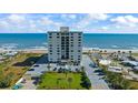 Oceanfront building, ample parking and surrounding area at 1513 Ocean Shore Blvd # 2B, Ormond Beach, FL 32176
