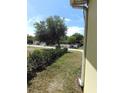 Image of side yard showcasing the property's landscaping and lawn at 1649 W Waycross Cir, Deltona, FL 32725