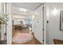 Elegant entryway with access to the living and dining areas at 1925 S Atlantic Ave # 706, Daytona Beach, FL 32118