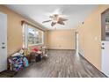 Spacious living room featuring wood-look floors at 1707 Palm Ave, Deland, FL 32724