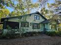 Charming two-story house with a spacious front yard at 1937 N Spring Garden Ave, Deland, FL 32720