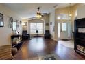 Large living room with hardwood floors and lots of natural light at 2911 Wild Pepper Ave, Deltona, FL 32725