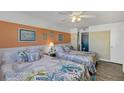 Guest bedroom with two double beds and en-suite bathroom access at 3509 S Atlantic Ave # 301, New Smyrna Beach, FL 32169