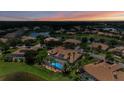 Aerial view of houses with pools in a Florida community at 3548 Tuscany Reserve Blvd, New Smyrna Beach, FL 32168