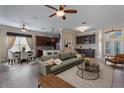 Spacious living room with hardwood floors, dining area, and seamless flow into the kitchen at 1278 Chessington Cir, Lake Mary, FL 32746