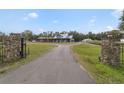 Long driveway leading to a charming farmhouse at 1330 E Taylor Rd, Deland, FL 32724