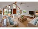 Bright living room with lots of natural light, tile floors, and comfortable seating at 2170 Wilmhurst Rd, Deland, FL 32720