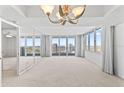 Spacious living room with panoramic views and lots of natural light at 3047 S Atlantic Ave # 1906, Daytona Beach, FL 32118