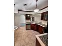 Kitchen with stainless steel appliances and tile floor at 8101 Via Bonita St, Sanford, FL 32771