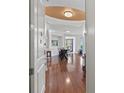Bright entryway with hardwood floors and access to living area at 1925 S Atlantic Ave # 703, Daytona Beach, FL 32118