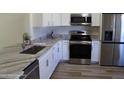 Modern kitchen with granite countertops and stainless steel appliances at 222 Oak Branch Dr, Edgewater, FL 32141