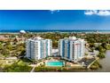 Aerial view of waterfront property with pool at 925 N Halifax Ave # 1001, Daytona Beach, FL 32118