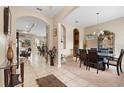 Elegant dining room with a large table and access to the living areas at 1105 Gardenshire Ln, Deland, FL 32724