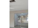 Sunroom with glass sliding doors and view of backyard at 2 Villa Villar Ct # 02, Deland, FL 32724