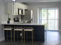 Modern kitchen with stainless steel appliances at 121 Reserve Cir # 209, Oviedo, FL 32765