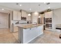 Modern kitchen featuring granite countertops and stainless steel appliances at 3009 Lake Tahoe St, Deland, FL 32724