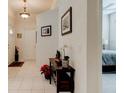 Bright entryway with tile floors and a wooden console table at 3162 Kailani Ct, Ormond Beach, FL 32174
