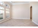 Spacious living room with neutral walls and tile floors at 43747 Choctaw St, Deland, FL 32720