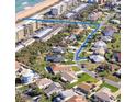 Panoramic aerial view of a coastal community with nearby beach access and well-maintained streets at 24 Sea Gull Dr, Ormond Beach, FL 32176