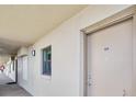 Exterior hallway leads to condo unit entrance at 3180 Ocean Shore Blvd # 309, Ormond Beach, FL 32176