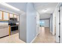 Cozy kitchen features stainless appliances and easy access to the living area at 3180 Ocean Shore Blvd # 309, Ormond Beach, FL 32176
