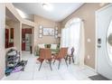Inviting living room with neutral tones, comfortable seating and view to kitchen enhances the home's appeal at 893 S Dean Cir, Deltona, FL 32738