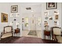 Spacious foyer features neutral tile flooring, complementing the home's architectural accents and bright, airy ambiance at 1924 Seclusion Dr, Port Orange, FL 32128