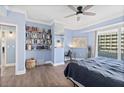Inviting main bedroom showcasing stylish decor, a cozy atmosphere, and access to the balcony with ocean views at 2403 S Atlantic Ave # 209, Daytona Beach Shores, FL 32118