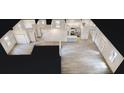 Modern home plan featuring kitchen, bathroom, bedrooms, and grand room with hardwood style floors throughout at 28 Guava Ln, Ocklawaha, FL 32179