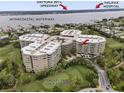 Beautiful aerial view of this condo building, overlooking a golf course and the Intracoastal Waterway at 4 Oceans West Blvd # 601A, Daytona Beach Shores, FL 32118