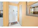 Entryway with tile floor and closet, conveniently located next to the kitchen at 2711 N Halifax Ave # 890, Daytona Beach, FL 32118