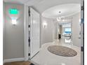 Elegant hallway with recessed lighting, neutral walls and ocean view at 3703 S Atlantic Ave # 507, Daytona Beach Shores, FL 32118