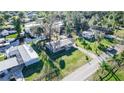 Aerial view of waterfront home with private access and lush vegetation at 55634 Sam St, Astor, FL 32102