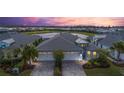 Beautiful aerial view of the home with a spacious driveway and lush landscaping at 583 Lost Shaker Way, Daytona Beach, FL 32124