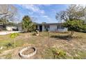 Single story house with a lawn at 1341 Imperial Dr, Daytona Beach, FL 32117