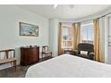 Comfortable bedroom with neutral tones, providing a peaceful space to relax and unwind at 2515 S Atlantic Ave # 401, Daytona Beach Shores, FL 32118