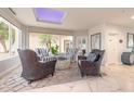 Inviting lobby with comfortable seating, natural light, and views of the lush outdoor landscape at 2967 S Atlantic Ave # 604, Daytona Beach, FL 32118