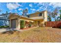 Charming two-story home with well-maintained landscaping and a cozy front yard, located in a desirable neighborhood at 1118 Meditation Loop, Port Orange, FL 32129